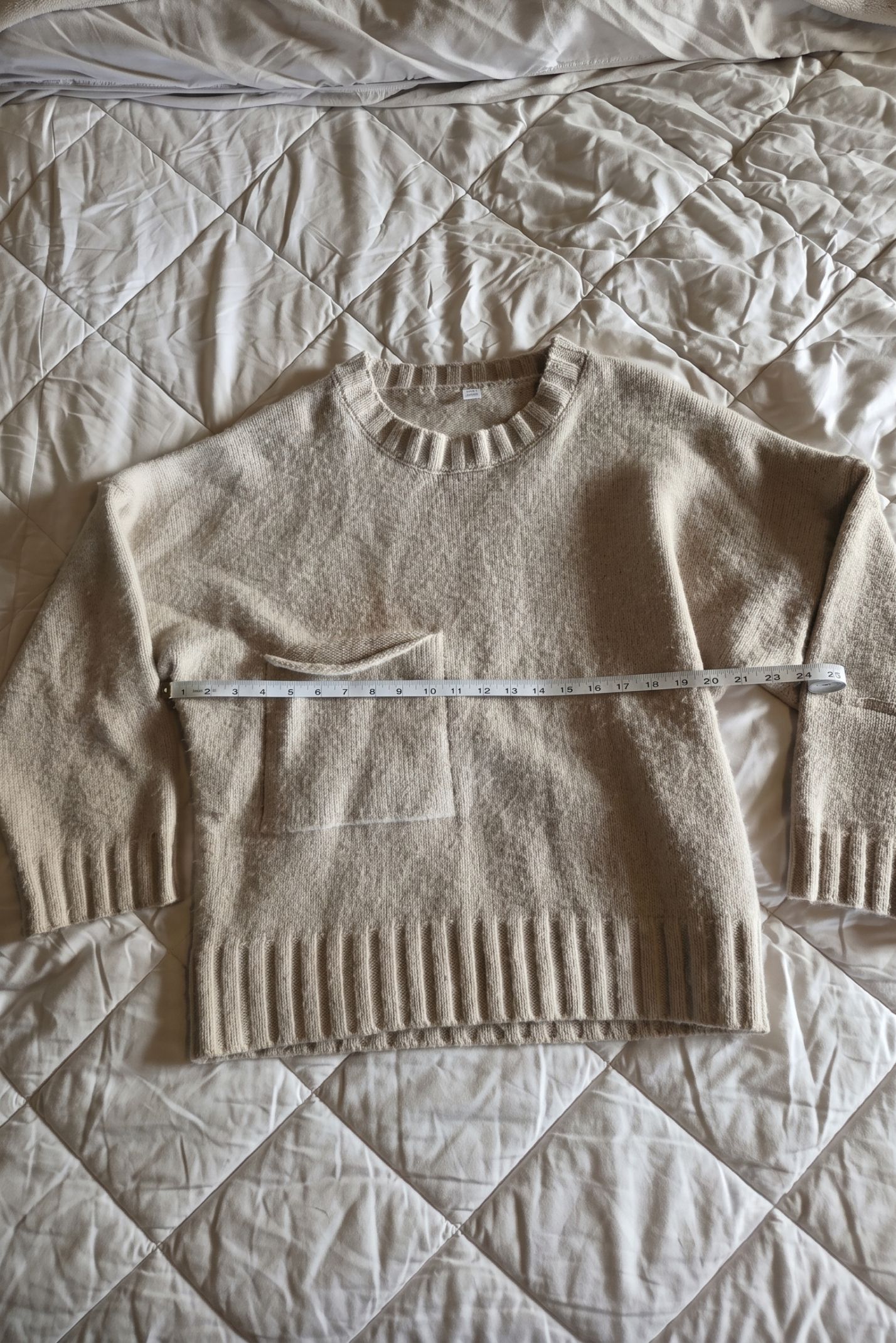 Flat lay with a tape measure across the chest